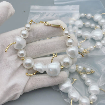 2025 New INS Style Light Luxury Elegant Cream Cherry Fruit Pattern Pearl Necklace Earrings Bracelet Three-piece Set